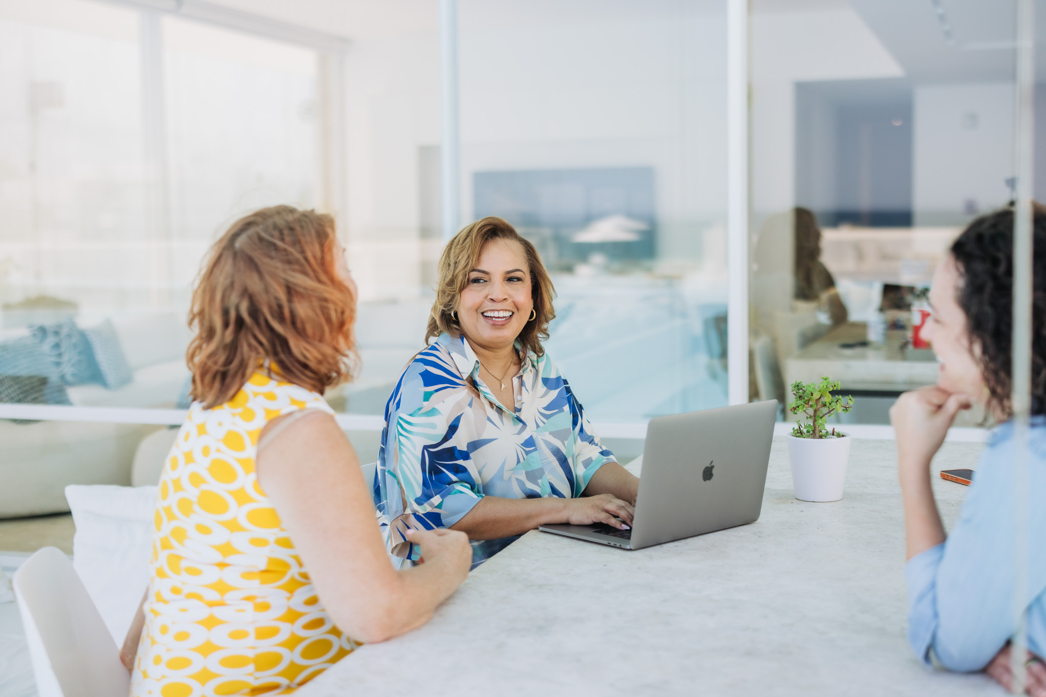 Tanya Blanchard working with a mortgage team